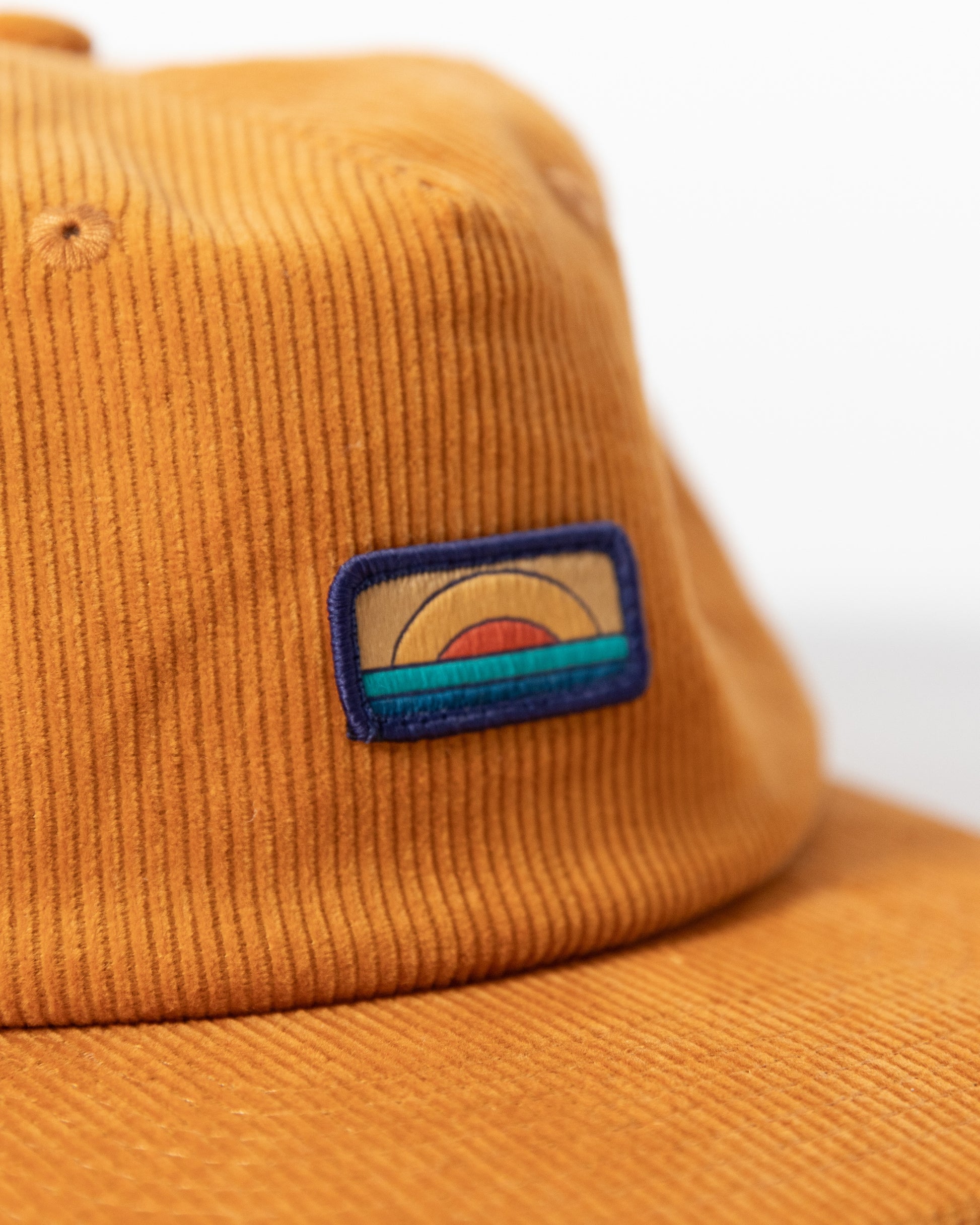 hat cap yellow logo