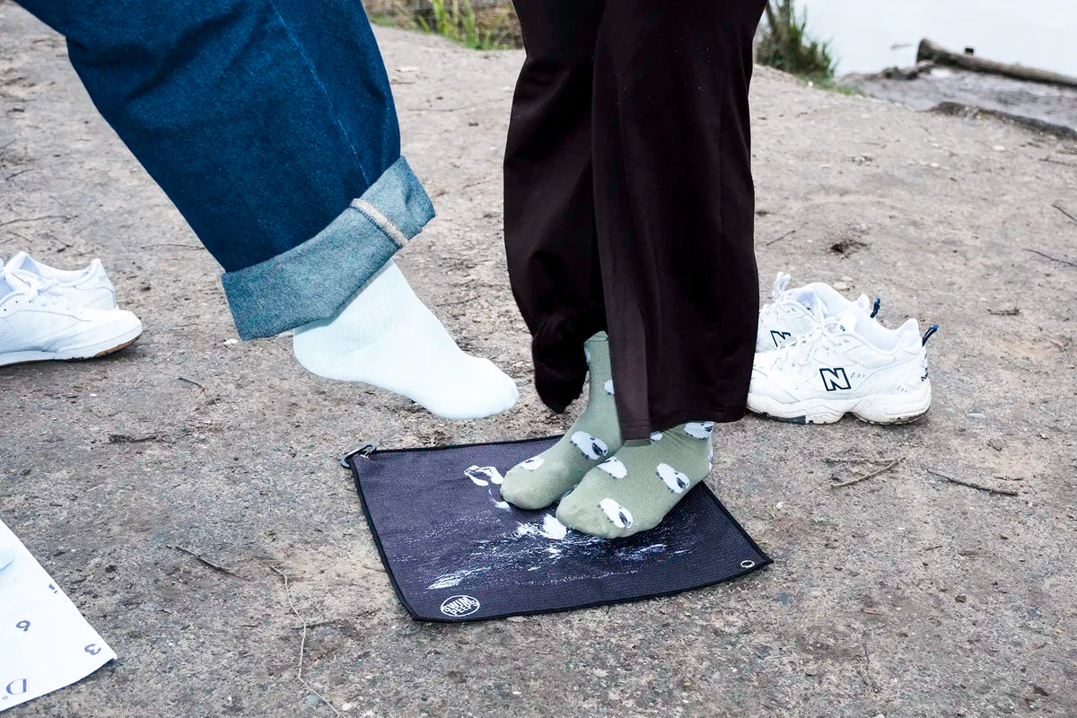 Image of the Swim Peeps Dry Step swim changing mat being used