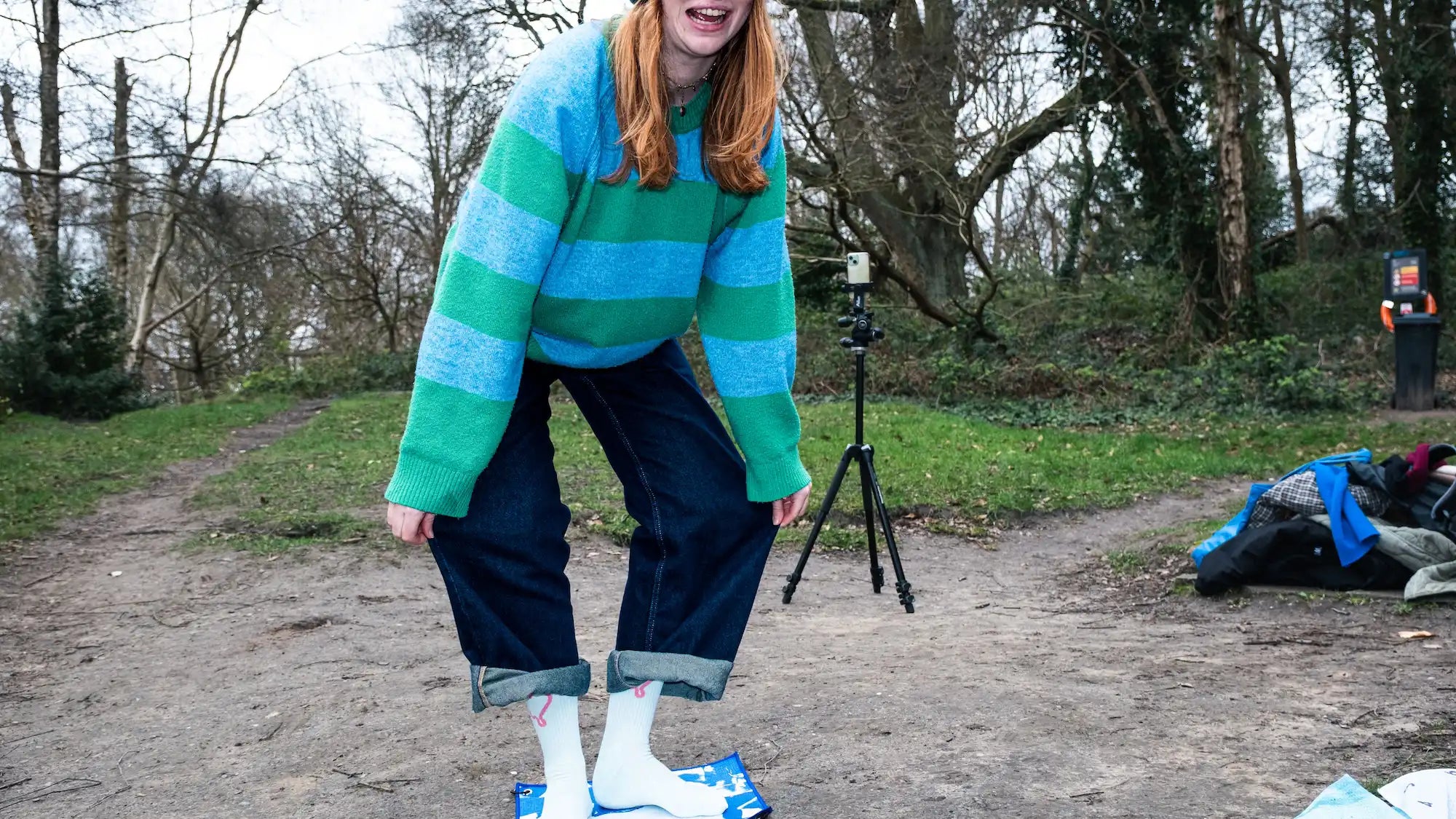 Urban swimmer standing on a Swim Peeps Dry Step Swim Changing Mat